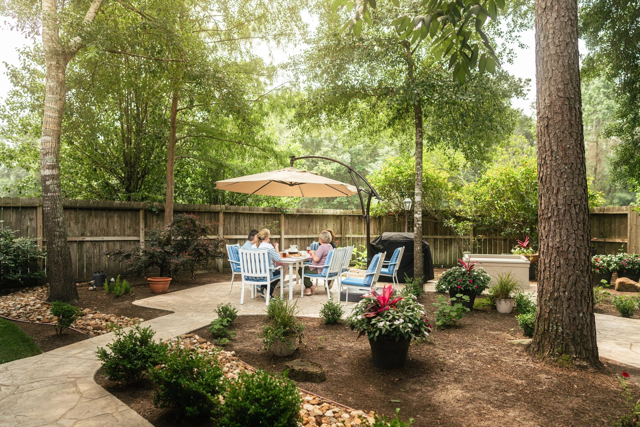 Friends gathering outdoors in a relaxed social setting